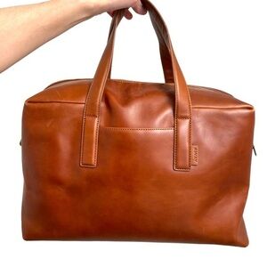 Always limited edition brown leather duffle bag unisex